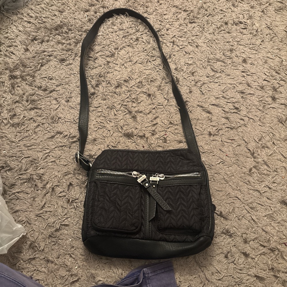 Black crossbody bag with zipper and velcro details